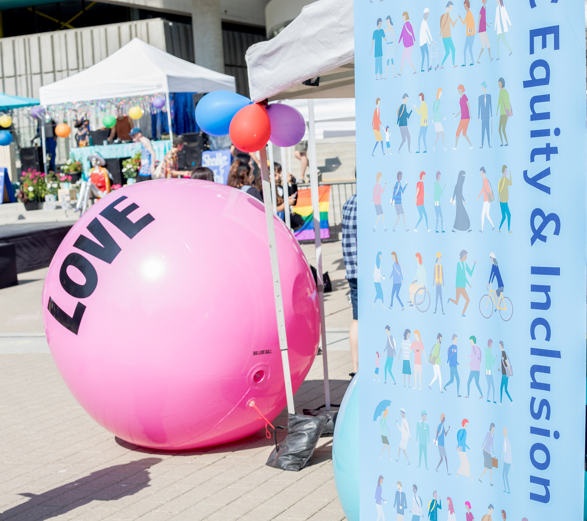 love ball and equity and inclusion banner at ubc pride