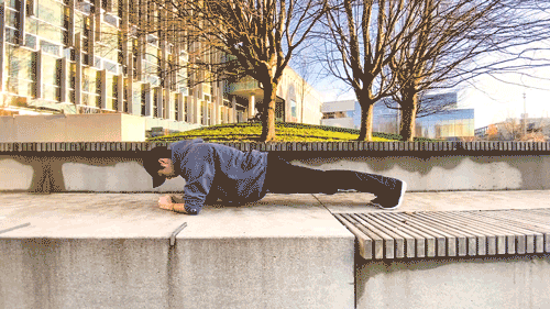 UBC Life student writer planking outside Nest
