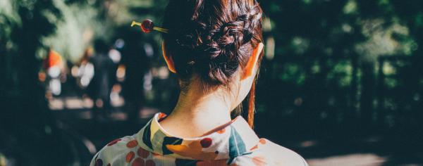 back of a girl's head with hairpin 