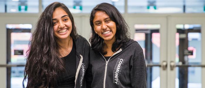 Two UBC female students smiling at the camera