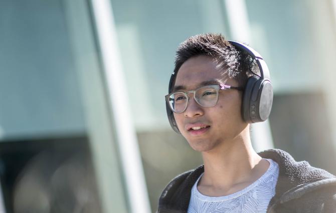 student with headphones
