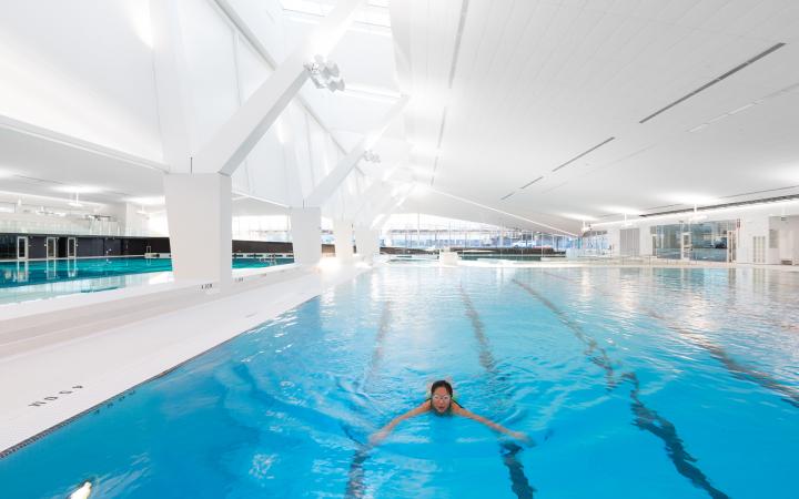 Student swimming in the new UBC Aquatic Centre Pool
