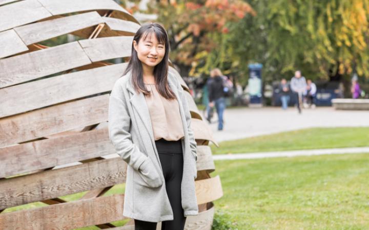 Meg Kuang, a UBC student, outdoors on campus